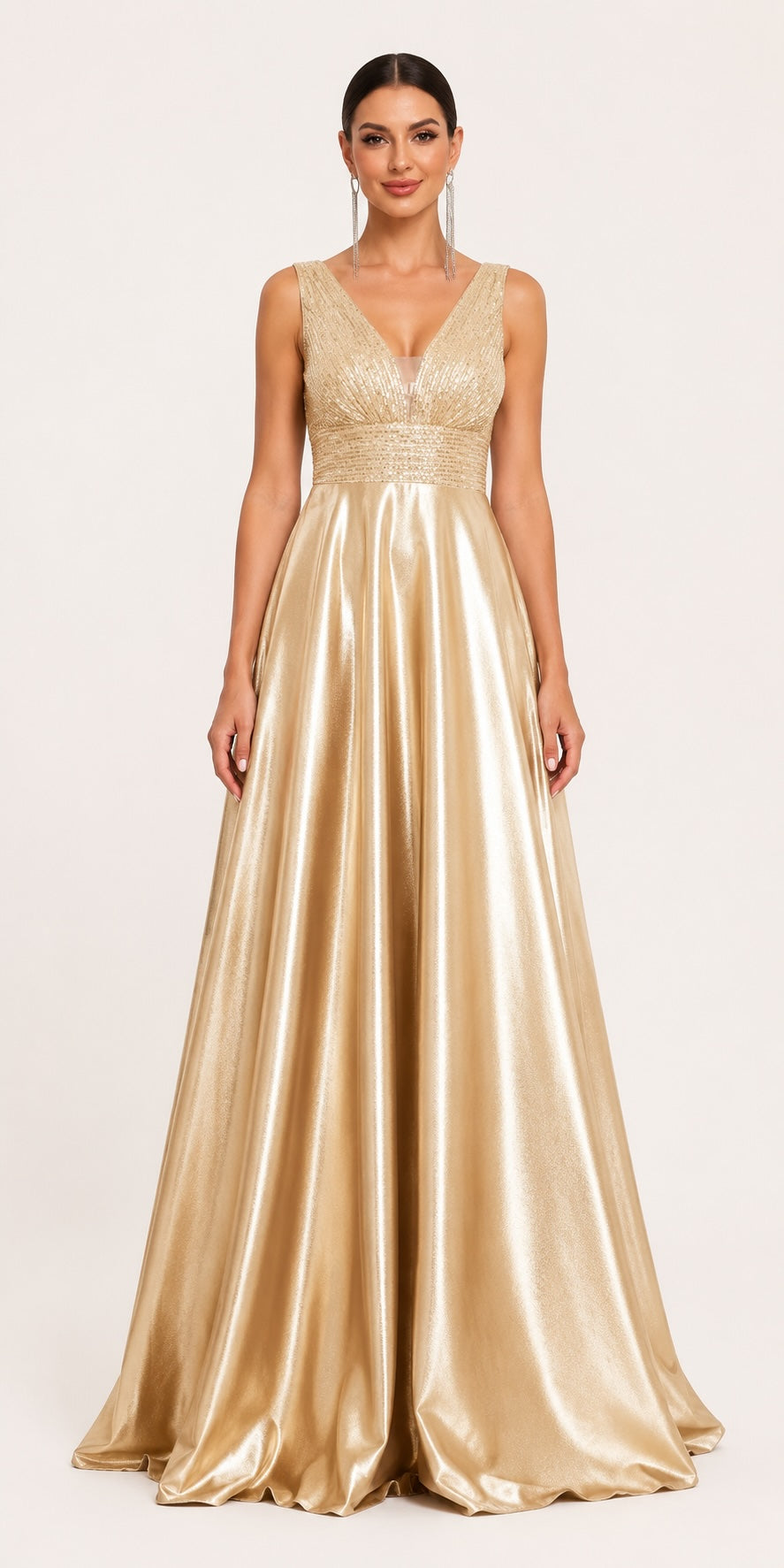 Robe longue de cérémonie champagne à jupe satinée volumineuse, décolleté plongeant et détails pailletés, idéale pour mariage, gala ou soirée de prestige.
