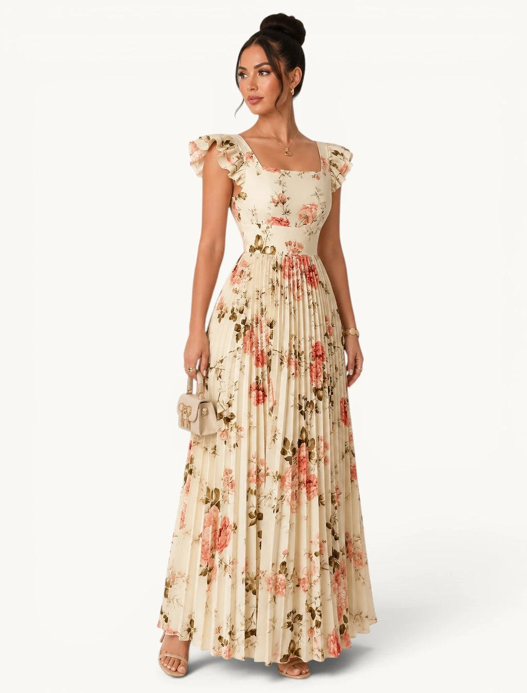 Robe longue plissée fleurie crème avec imprimé roses romantiques, encolure carrée et manches volantées, idéale pour mariage champêtre, cérémonie ou garden-party élégante.